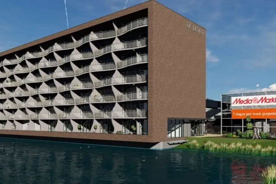 Eerste paal van het appartementengebouw De Bever